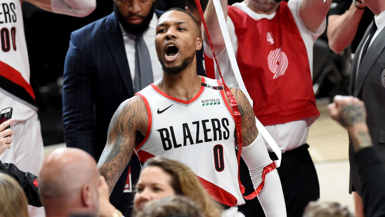 PORTLAND, OREGON - APRIL 23: Damian Lillard #0 of the Portland Trail Blazers reacts after hitting the game winning shot in Game Five of the Western Conference quarterfinals against the Oklahoma City Thunder during the 2019 NBA Playoffs at Moda Center on April 23, 2019 in Portland, Oregon. The Blazers won 118-115.
