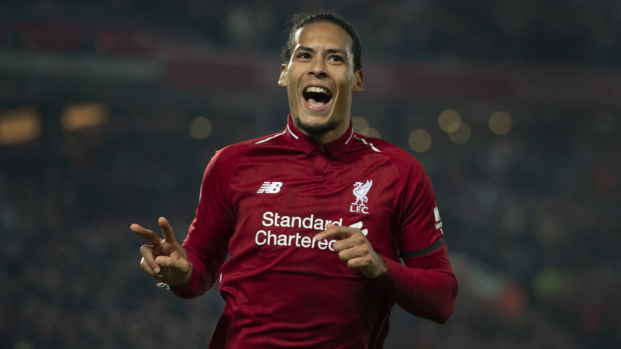 LIVERPOOL, ENGLAND - FEBRUARY 27: Virgil van Dijk of Liverpool celebrates scoring his second goal during the Premier League match between Liverpool FC and Watford FC at Anfield on February 27, 2019 in Liverpool, United Kingdom.