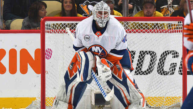 PITTSBURGH, PA - APRIL 16: Robin Lehner #40 of the New York Islanders defends the net against the Pittsburgh Penguins in Game Four of the Eastern Conference First Round during the 2019 NHL Stanley Cup Playoffs at PPG Paints Arena on April 16, 2019 in Pittsburgh, Pennsylvania.