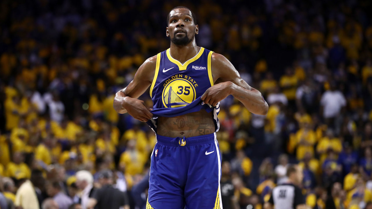 OAKLAND, CALIFORNIA - APRIL 24: Kevin Durant #35 of the Golden State Warriors walks off the court after they lost to the LA Clippers in Game Five of the first round of the 2019 NBA Western Conference Playoffs at ORACLE Arena on April 24, 2019 in Oakland, California.