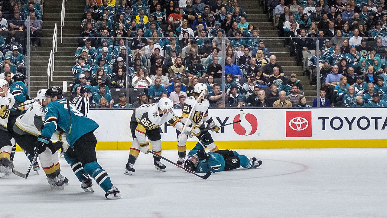 SAN JOSE, CA - APRIL 23: San Jose Sharks center Joe Pavelski (8) goes down on the ice in front of Vegas Golden Knights center Paul Stastny (26) and Vegas Golden Knights center Cody Eakin (21) during Game 7, Round 1 between the Vegas Golden Knights and the San Jose Sharks on Tuesday, April 23, 2019 at the SAP Center in San Jose, California.