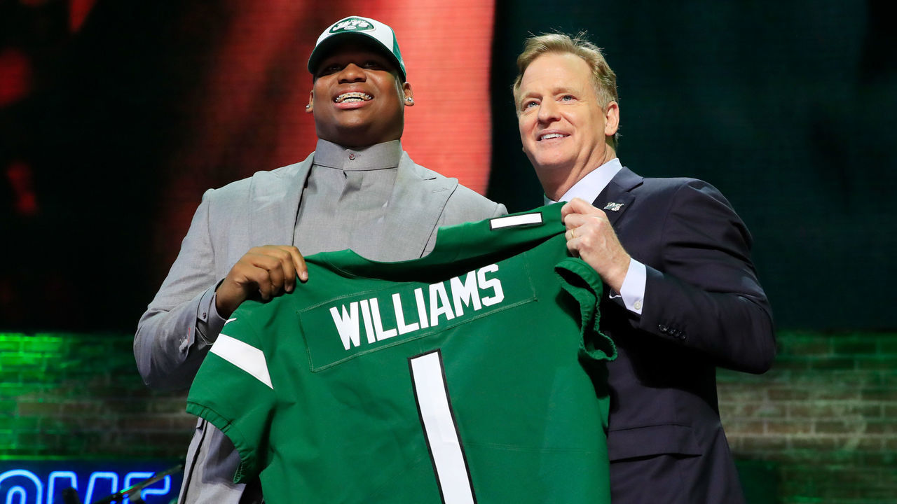 NASHVILLE, TENNESSEE - APRIL 25: Quinnen Williams of Alabama poses with NFL Commissioner Roger Goodell after he was picked #3 overall by the New York Jets during the first round of the 2019 NFL Draft on April 25, 2019 in Nashville, Tennessee.