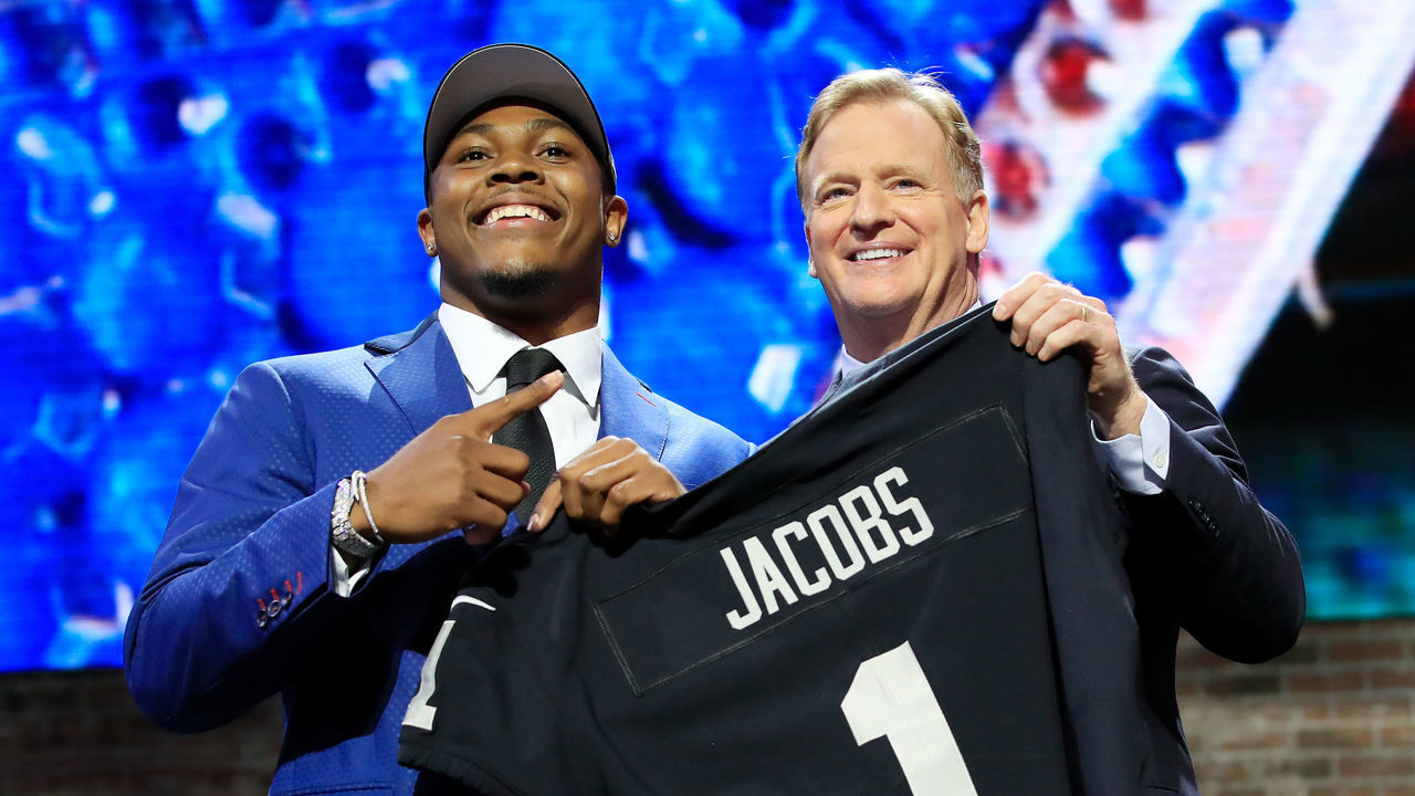 NASHVILLE, TENNESSEE - APRIL 25: Josh Jacobs of Alabama poses with NFL Commissioner Roger Goodell after being chosen #24 overall by the Oakland Raiders during the first round of the 2019 NFL Draft on April 25, 2019 in Nashville, Tennessee.