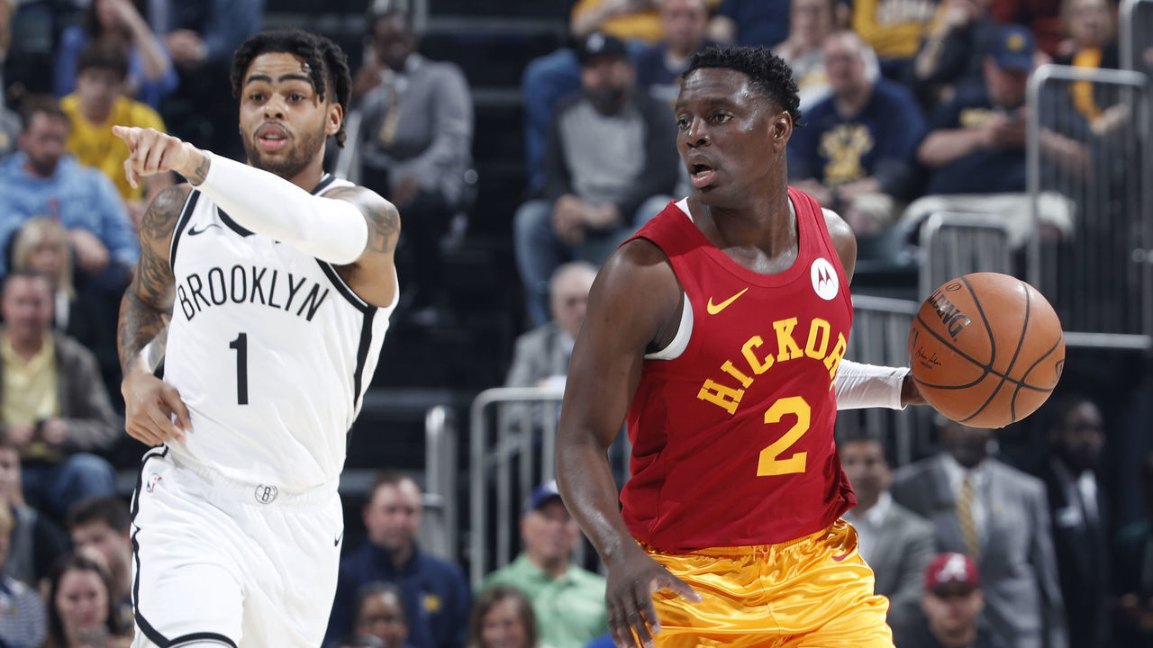 INDIANAPOLIS, IN - APRIL 07: Darren Collison #2 of the Indiana Pacers dribbles the ball up court ahead of D'Angelo Russell #1 of the Brooklyn Nets in the first half of a game at Bankers Life Fieldhouse on April 7, 2019 in Indianapolis, Indiana. NOTE TO USER: User expressly acknowledges and agrees that, by downloading and or using the photograph, User is consenting to the terms and conditions of the Getty Images License Agreement.