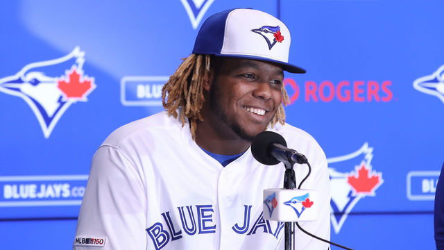 TORONTO, ON - APRIL 26: Vladimir Guerrero Jr. #27 of the Toronto Blue Jays smiles as he speaks to the media through an interpreter as he is introduced before his MLB debut later tonight against the Oakland Athletics at Rogers Centre on April 26, 2019 in Toronto, Canada.