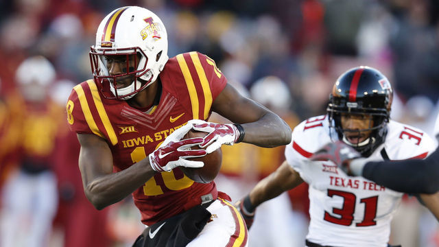 AMES, IA - NOVEMBER 19: Wide receiver Hakeem Butler #18 of the Iowa State Cyclones drives the ball past defensive back Justis Nelson #31 of the Texas Tech Red Raiders for a touchdown in the first half of play at Jack Trice Stadium on November 19, 2016 in Ames, Iowa.