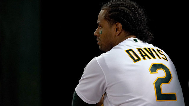 OAKLAND, CA - APRIL 22: Khris Davis #2 of the Oakland Athletics looks on from the dugout against the Texas Rangers in the top of the ninth inning of a Major League Baseball game at Oakland-Alameda County Coliseum on April 22, 2019 in Oakland, California.
