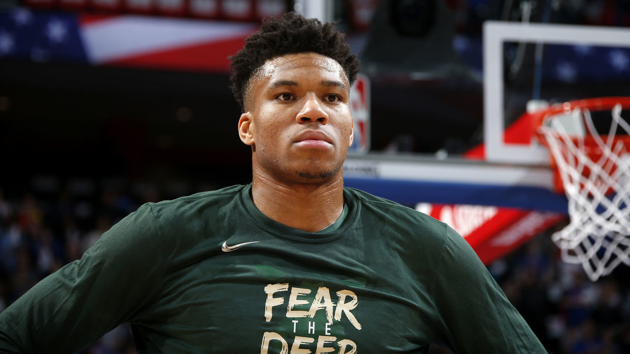 DETROIT, MI - APRIL 22: Giannis Antetokounmpo #34 of the Milwaukee Bucks stands for the National Anthem before Game Four of Round One against the Detroit Pistons during the 2019 NBA Playoffs on April 22, 2019 at Little Caesars Arena in Detroit, Michigan. NOTE TO USER: User expressly acknowledges and agrees that, by downloading and/or using this photograph, user is consenting to the terms and conditions of the Getty Images License Agreement. Mandatory Copyright Notice: Copyright 2019 NBAE