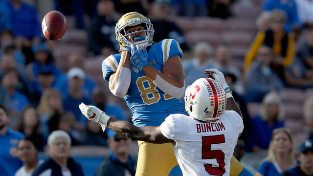 PASADENA, CA - NOVEMBER 24: Frank Buncom #5 of the Stanford Cardinal breaks up a pass play intended for Caleb Wilson #81 of the UCLA Bruins during the second half of a game at the Rose Bowl on November 24, 2018 in Pasadena, California.