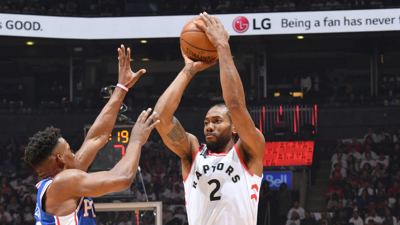 TORONTO, CANADA - APRIL 27: Kawhi Leonard #2 of the Toronto Raptors shoots the ball against the Philadelphia 76ers during Game One of the Eastern Conference Semi-Finals of the 2019 NBA Playoffs on April 27, 2019 at the Scotiabank Arena in Toronto, Ontario, Canada. Mandatory Copyright Notice: Copyright 2019 NBAE
