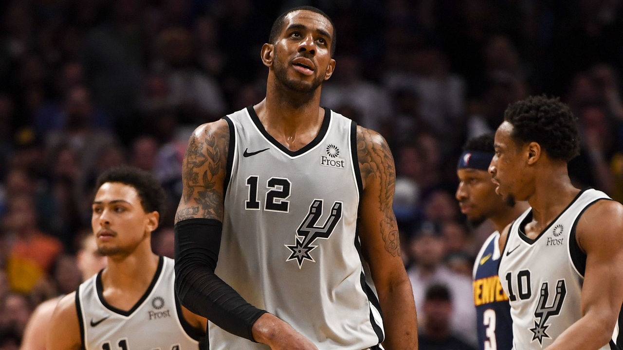 DENVER, CO - APRIL 27: LaMarcus Aldridge (12) of the San Antonio Spurs shows signs of frustration against the Denver Nuggets during the fourth quarter of the Nuggets' 90-86 game seven win on Saturday, April 27, 2019. The Denver Nuggets and the San Antonio Spurs game seven of their first round NBA playoff series.