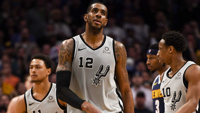 DENVER, CO - APRIL 27: LaMarcus Aldridge (12) of the San Antonio Spurs shows signs of frustration against the Denver Nuggets during the fourth quarter of the Nuggets' 90-86 game seven win on Saturday, April 27, 2019. The Denver Nuggets and the San Antonio Spurs game seven of their first round NBA playoff series.