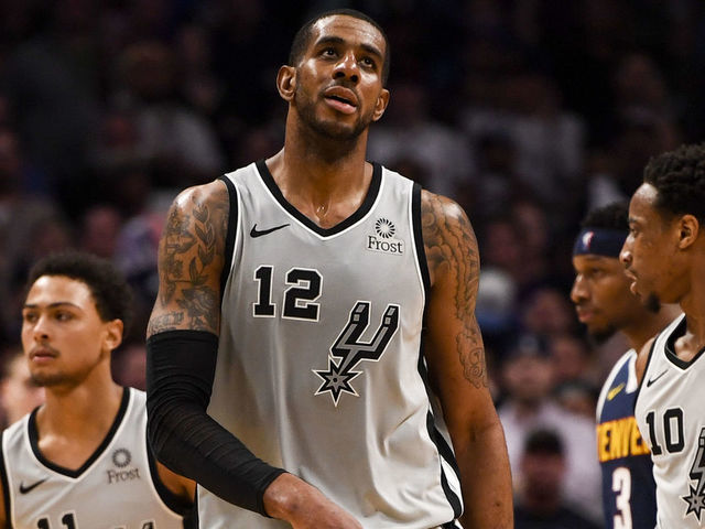 DENVER, CO - APRIL 27: LaMarcus Aldridge (12) of the San Antonio Spurs shows signs of frustration against the Denver Nuggets during the fourth quarter of the Nuggets' 90-86 game seven win on Saturday, April 27, 2019. The Denver Nuggets and the San Antonio Spurs game seven of their first round NBA playoff series.