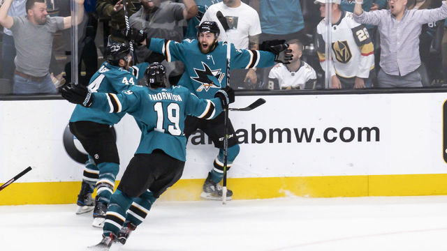 SAN JOSE, CA - APRIL 23: San Jose Sharks center Joe Thornton (19) and San Jose Sharks defenseman Marc-Edouard Vlasic (44) rush in to congratulate San Jose Sharks right wing Barclay Goodrow (23) for the game winning goal in Game 7, Round 1 between the Vegas Golden Knights and the San Jose Sharks on Tuesday, April 23, 2019 at the SAP Center, San Jose, CA.