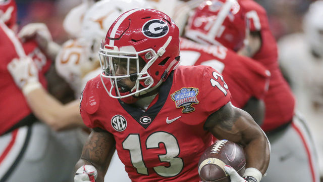 NEW ORLEANS, LA - JANUARY 01: Georgia Bulldogs running back Elijah Holyfield (13) carries around the end during the Allstate Sugar Bowl game between the Georgia Bulldogs and the Texas Longhorns on January 1, 2019 at the Mercedes-Benz Superdome in New Orleans, LA.