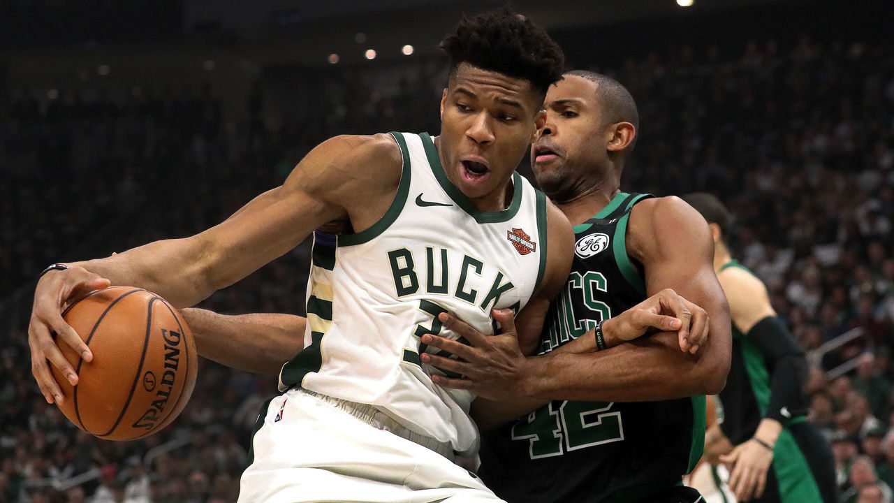MILWAUKEE - APRIL 28: Boston Celtics center Al Horford (42) strips the ball away from Milwaukee Bucks forward Giannis Antetokounmpo (34) during the first quarter. The Milwaukee Bucks host the Boston Celtics in Game 1 of the Eastern Conference NBA Semi-Finals at Fiserv Forum in Milwaukee on April 28, 2019.