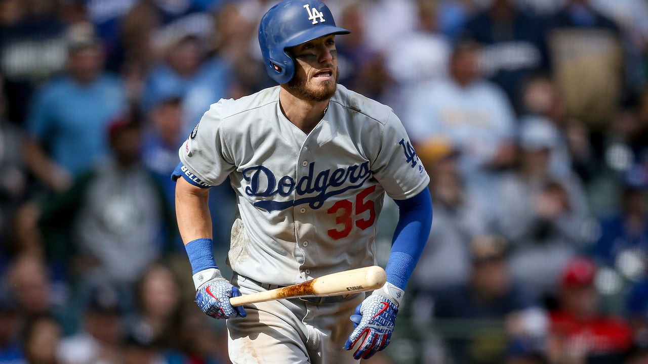 MILWAUKEE, WISCONSIN - APRIL 21: Cody Bellinger #35 of the Los Angeles Dodgers hits a home run in the ninth inning against the Milwaukee Brewers at Miller Park on April 21, 2019 in Milwaukee, Wisconsin.