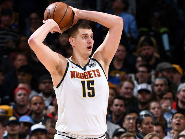 DENVER, CO - APRIL 29: Nikola Jokic #15 of the Denver Nuggets looks to pass against the Portland Trail Blazers during Game One of the Western Conference Semifinals of the 2019 NBA Playoffs on April 29, 2019 at the Pepsi Center in Denver, Colorado. NOTE TO USER: User expressly acknowledges and agrees that, by downloading and/or using this photograph, user is consenting to the terms and conditions of the Getty Images License Agreement. Mandatory Copyright Notice: Copyright 2019 NBAE