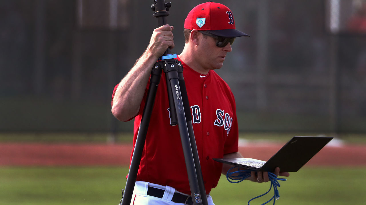 FORT MYERS, FL - FEBRUARY 19: Boston Red Sox assistant pitching coach Brian Bannister (86) carries a camera and laptop during spring training at JetBlue Park in Fort Myers, FL on Feb. 19, 2019.