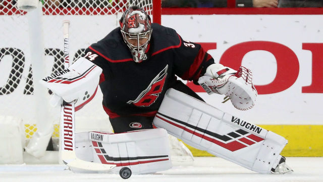 RALEIGH, NC - APRIL 18: Petr Mrazek #34 of the Carolina Hurricanes goes down in the crease to play the puck in Game Four of the Eastern Conference First Round against the Washington Capitals during the 2019 NHL Stanley Cup Playoffs on April 18, 2019 at PNC Arena in Raleigh, North Carolina.