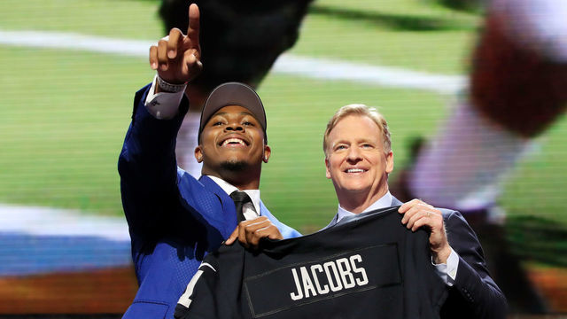 NASHVILLE, TENNESSEE - APRIL 25: Josh Jacobs of Alabama poses with NFL Commissioner Roger Goodell after being chosen #24 overall by the Oakland Raiders during the first round of the 2019 NFL Draft on April 25, 2019 in Nashville, Tennessee.