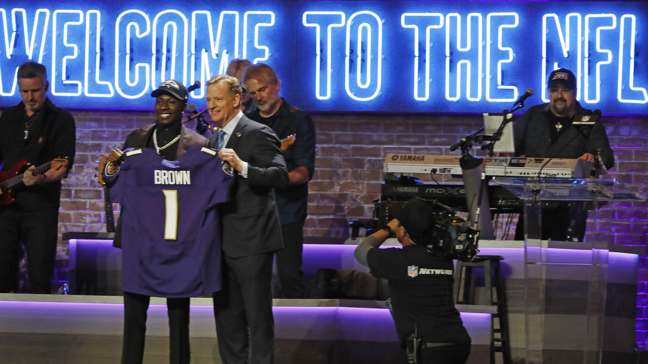 NASHVILLE, TENNESSEE - APRIL 25: Wide receiver Marquise Brown poses with NFL Commissioner Roger Goodell after being selected by Baltimore Ravens with pick 25 on day 1 of the 2019 NFL Draft on April 25, 2019 in Nashville, Tennessee.