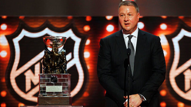 LAS VEGAS, NV - JUNE 22: GM Mike Gillis of the Vancouver Canucks accepts the NHL General Manager of the Year Award during the 2011 NHL Awards at The Pearl concert theater at the Palms Casino Resort June 22, 2011 in Las Vegas, Nevada.