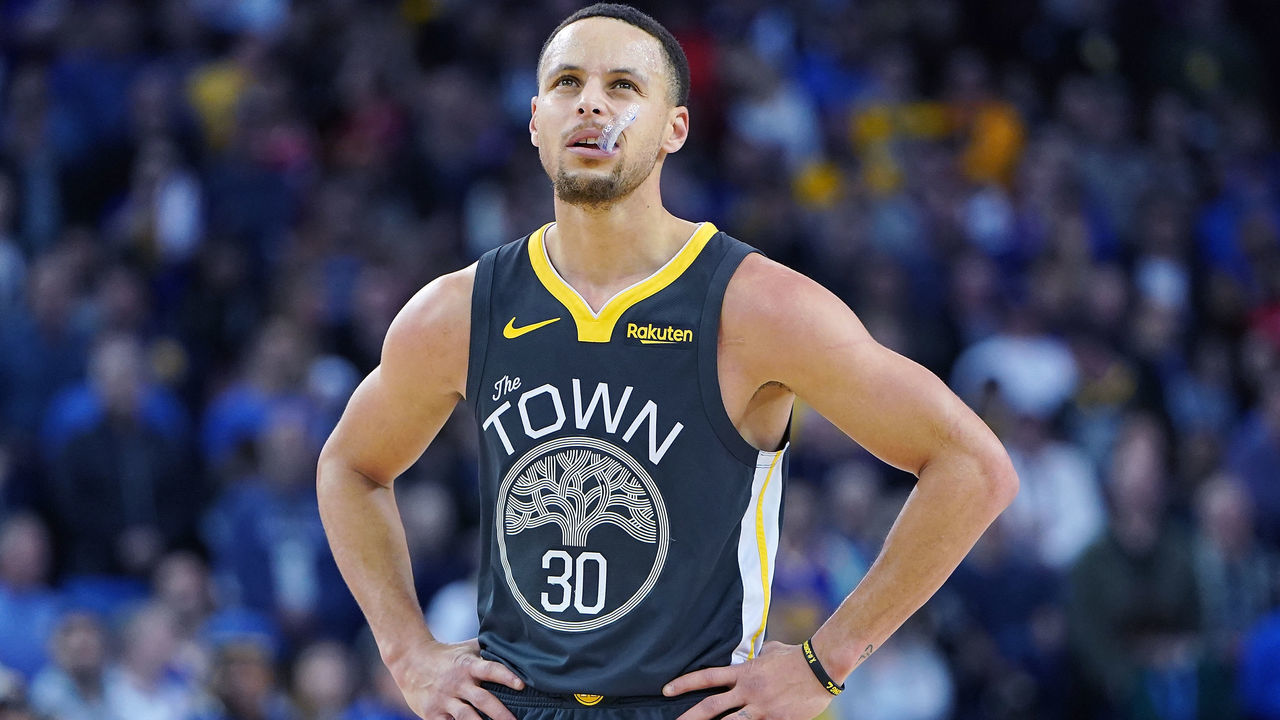 OAKLAND, CA - FEBRUARY 23: Stephen Curry #30 of the Golden State Warriors looks on against the Houston Rockets during an NBA basketball game at ORACLE Arena on February 23, 2019 in Oakland, California.