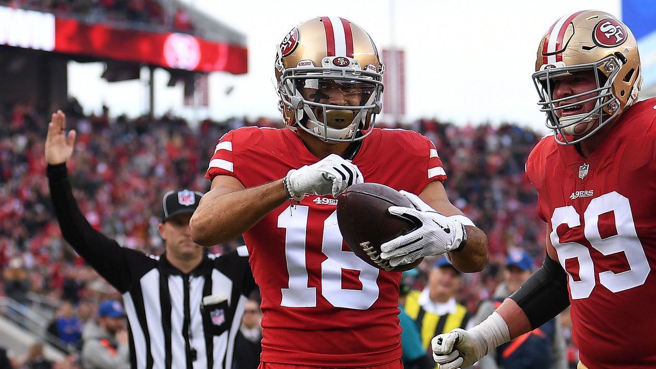 SANTA CLARA, CA - DECEMBER 09: Dante Pettis #18 of the San Francisco 49ers celebrates after scoring on a one-yard catch against the Denver Broncos during their NFL game at Levi's Stadium on December 9, 2018 in Santa Clara, California.