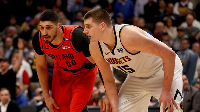 DENVER, COLORADO - MAY 01: Enes Kanter #00 of the Portland Trail Blazerslines up for a freethrow against Nikola Jokic #15 of the Denver Nuggets in the fourth quarter during Game Two of the Western Conference Semi-Finals of the 2019 NBA Playoffs at the Pepsi Center on May 1, 2019 in Denver, Colorado.