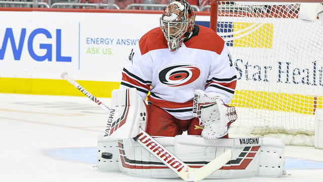WASHINGTON, DC - APRIL 20: Carolina Hurricanes goaltender Petr Mrazek (34) makes a first period save against the Washington Capitals on April 20, 2019, at the Capital One Arena in Washington, D.C. in the first round of the Stanley Cup Playoffs.