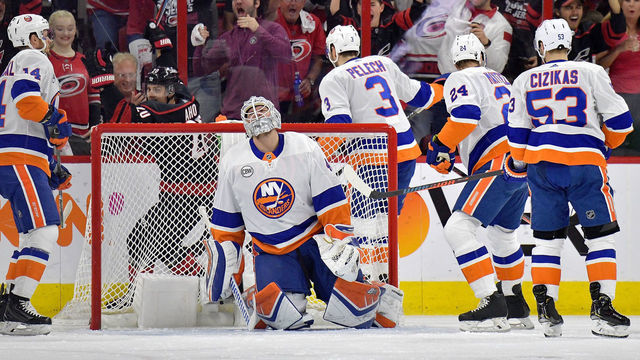 RALEIGH, NORTH CAROLINA - MAY 03: Sebastian Aho #20 of the Carolina Hurricanes reacts after scoring a goal against Robin Lehner #40 of the New York Islanders in the first period of Game Four of the Eastern Conference Second Round during the 2019 NHL Stanley Cup Playoffs at PNC Arena on May 03, 2019 in Raleigh, North Carolina.