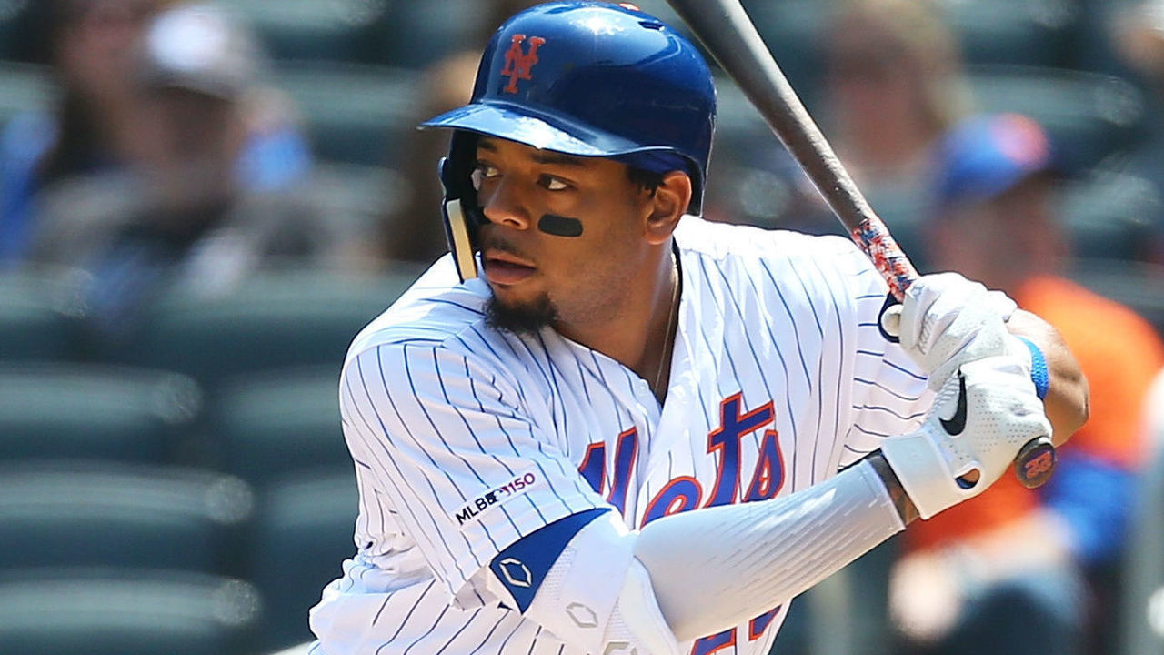 NEW YORK, NEW YORK - MAY 02: Dominic Smith #22 of the New York Mets in action against the Cincinnati Reds at Citi Field on May 02, 2019 in New York City. New York Mets defeated the Cincinnati Reds 1-0.