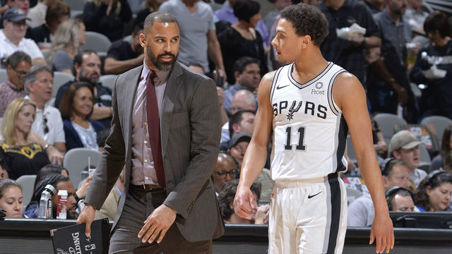 SAN ANTONIO, TX - APRIL 25: Assistant Coach Ime Udoka speaks with Bryn Forbes #11 of the San Antonio Spurs during Game Six of Round One against the Denver Nuggets of the 2019 NBA Playoffs on April 25, 2019 at the AT&T Center in San Antonio, Texas. NOTE TO USER: User expressly acknowledges and agrees that, by downloading and/or using this photograph, user is consenting to the terms and conditions of the Getty Images License Agreement. Mandatory Copyright Notice: Copyright 2019 NBAE (Photos by Mark Sobhani/NBAE via Getty Images)