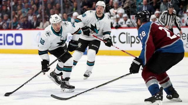 DENVER, COLORADO - MAY 02: Kevin Labanc #62 of the San Jose Sharks looks for an opening on goal against Ian Cole #28 of the Colorado Avalanche in the third period during Game Four of the Western Conference Second Round during the 2019 NHL Stanley Cup Playoffs at the Pepsi Center on May 2, 2019 in Denver, Colorado.