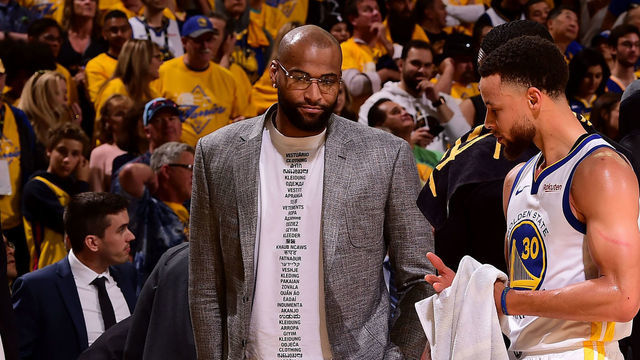 OAKLAND, CA - APRIL 28: DeMarcus Cousins #0, and Stephen Curry #30 of the Golden State Warriors talk after Game One of the Western Conference Semifinals of the 2019 NBA Playoffs against the Houston Rockets on April 28, 2019 at ORACLE Arena in Oakland, California. Mandatory Copyright Notice: Copyright 2019 NBAE