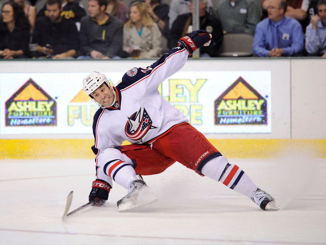 GIF: Derek MacKenzie can't get up after snapping his skate blade off