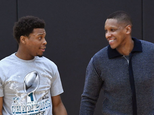TORONTO, CANADA - FEBRUARY 05: Kyle Lowry #7 and Masai Ujiri of the Toronto Raptors greet each other during an open practice at BioSteel Centre Toronto Ontario, Canada on February 5, 2018. Mandatory Copyright Notice: Copyright 2018 NBAE