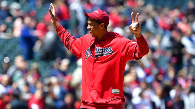 CLEVELAND, OHIO - MAY 05: Former Cleveland Cavalier Channing Frye waves to the crowd before throwing out the ceremonial first pitch prior to the game between the Cleveland Indians and the Seattle Mariners at Progressive Field on May 05, 2019 in Cleveland, Ohio.
