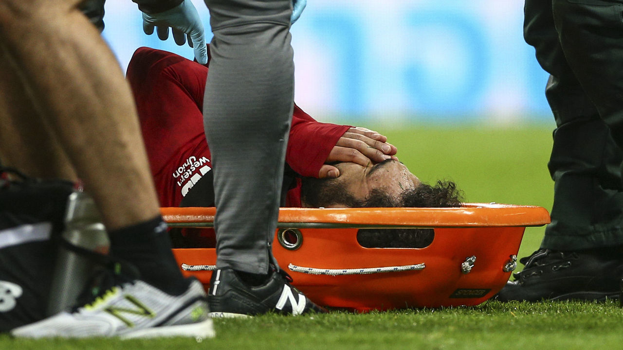 4th May 2019, St James Park, Newcastle upon Tyne, England; EPL Premier League football, Newcastle United versus Liverpool; Mohamed Salah of Liverpool covers his face just before he is carried off after a clash with Martin Dubravka of Newcastle United