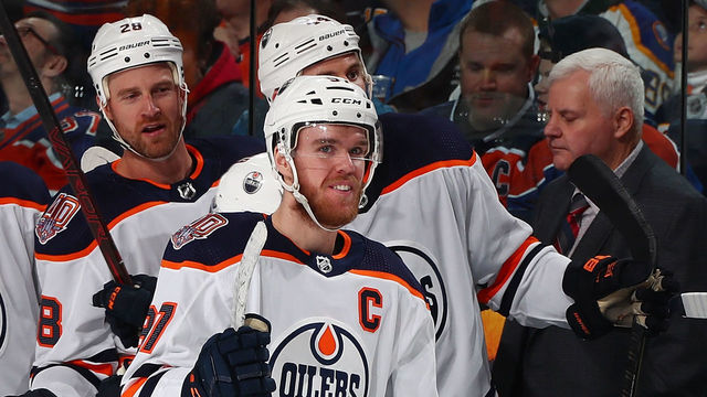 BUFFALO, NY - MARCH 4: Connor McDavid #97 of the Edmonton Oilers smiles at the bench during an NHL game against the Buffalo Sabres on March 4, 2019 at KeyBank Center in Buffalo, New York.