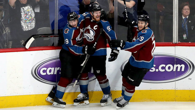 DENVER, COLORADO - MAY 06: Gabriel Landeskog #92 of the Colorado Avalanche celebrates with Samuel Girard #49 and Nathan MacKinnon #29 after scoring the winning goal against the San Jose Sharks in overtime during Game Six of the Western Conference Second Round during the 2019 NHL Stanley Cup Playoffs at the Pepsi Center on May 6, 2019 in Denver, Colorado.