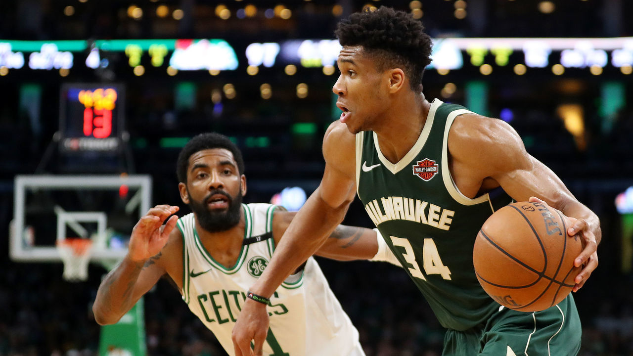 BOSTON, MASSACHUSETTS - MAY 03: Giannis Antetokounmpo #34 of the Milwaukee Bucks drives against Kyrie Irving #11 of the Boston Celtics during the second half of Game 3 of the Eastern Conference Semifinals of the 2019 NBA Playoffs at TD Garden on May 03, 2019 in Boston, Massachusetts. The Bucks defeat the Celtics 123 - 116.