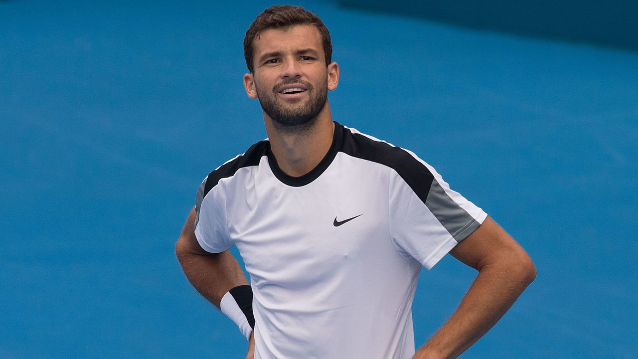 Girgor Dimitrov of Bulgaria watches the big screen during his semi final match against Luxembourg's Gillies Muller on Ken Rosewall Arena at the Apia International Sydney at Sydney Olympic Park Tennis Centre. Sydney, Australia, Friday, January. 15th, 2016. (Photo: Steve Christo)