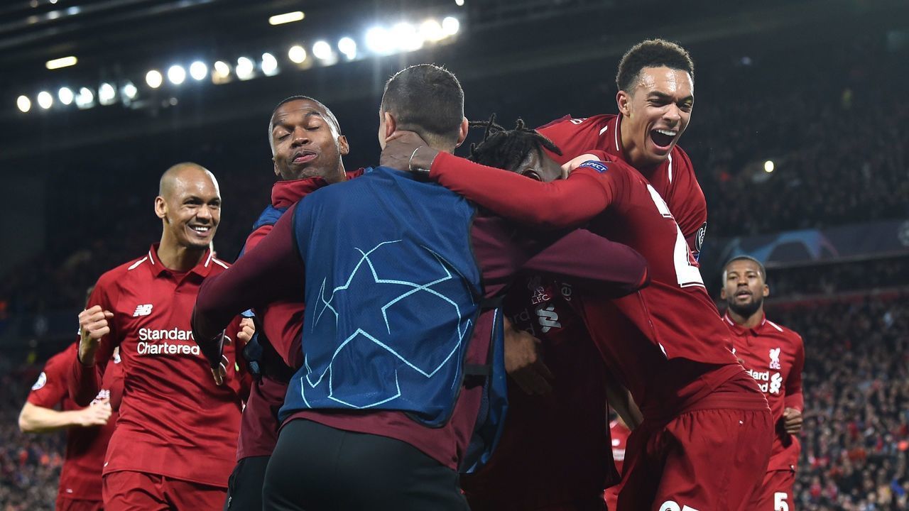 The Liverpool celebrate after scoring their fourth goal during the UEFA Champions league semi-final second leg football match between Liverpool and Barcelona at Anfield in Liverpool, north west England on May 7, 2019.