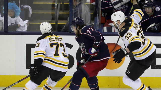 COLUMBUS, OH - MAY 6: Boston Bruins defensemen Charlie McAvoy (73) and Zdeno Chara (33) sandwich Columbus Blue Jackets right wing Josh Anderson (77) during the second period. The Columbus Blue Jackets host the Boston Bruins in Game 6 of the Eastern Conference semifinals at Nationwide Arena in Columbus, OH on May 6, 2019.