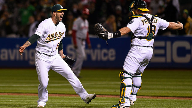 OAKLAND, CA - MAY 07: Oakland Athletics starting pitcher Mike Fiers (50) celebrates with catcher Josh Phegley (19) after pitching a no-hitter during the Major League Baseball game between the Cincinnati Reds and the Oakland Athletics at Oakland-Alameda County Coliseum on May 7, 2019 in Oakland, CA.