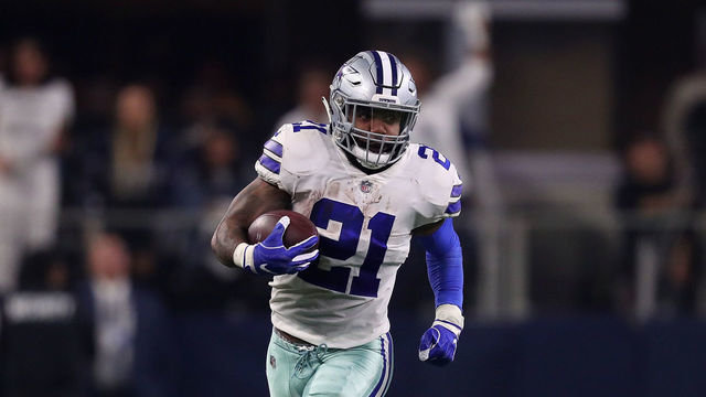 ARLINGTON, TEXAS - JANUARY 05: Ezekiel Elliott #21 of the Dallas Cowboys runs the ball in the second quarter against the Seattle Seahawks during the Wild Card Round at AT&T Stadium on January 05, 2019 in Arlington, Texas.