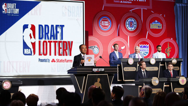 CHICAGO - MAY 15: NBA Deputy Commissioner, Mark Tatum awards the New York Knicks the number nine pick in the 2018 NBA Draft during the 2018 NBA Draft Lottery at the Palmer House Hotel on May 15, 2018 in Chicago Illinois. NOTE TO USER: User expressly acknowledges and agrees that, by downloading and/or using this photograph, user is consenting to the terms and conditions of the Getty Images License Agreement. Mandatory Copyright Notice: Copyright 2018 NBAE