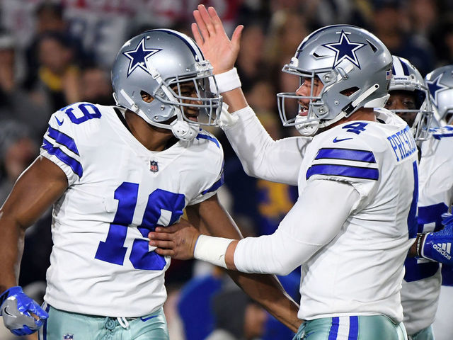 LOS ANGELES, CA - JANUARY 12: Amari Cooper #19 of the Dallas Cowboys celebrates a 29 yard touchdown pass from Dak Prescott #4 in the first quarter against the Los Angeles Rams in the NFC Divisional Playoff game at Los Angeles Memorial Coliseum on January 12, 2019 in Los Angeles, California.
